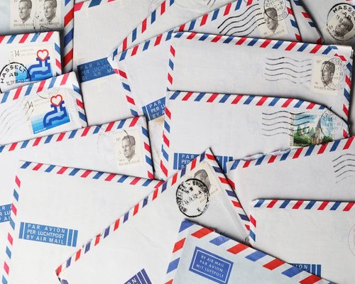 Mail envelopes indicating contact